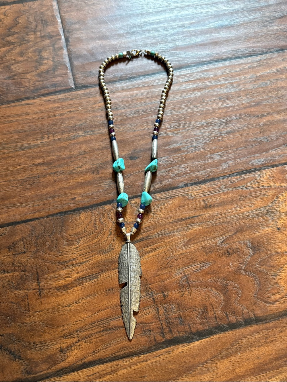 Turquoise Bead Necklace with Gold Feather Pendant